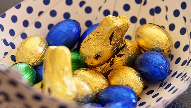Easter eggs and chocolate in a basket