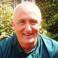 Dr Gilbert McKnight - Director